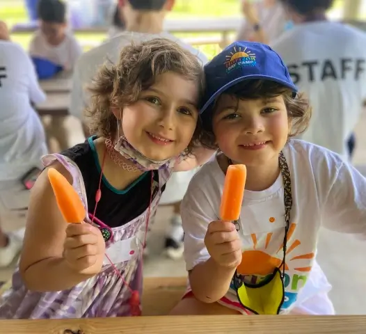 Boy and girl eating ice cream